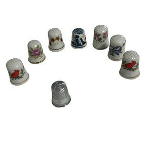 Lot of 8 collectible thimbles 7 porcelain/ceramic 1 metal cardinals delft floral